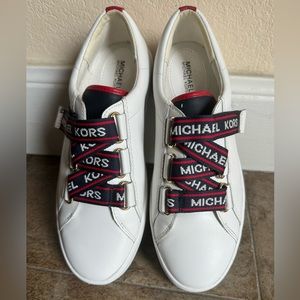 Micheal Kors White Leather Sneakers with velcro closure. Size 6.5